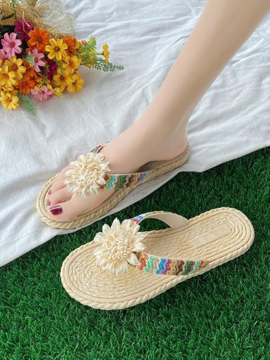 Braided floral resort style flip flops