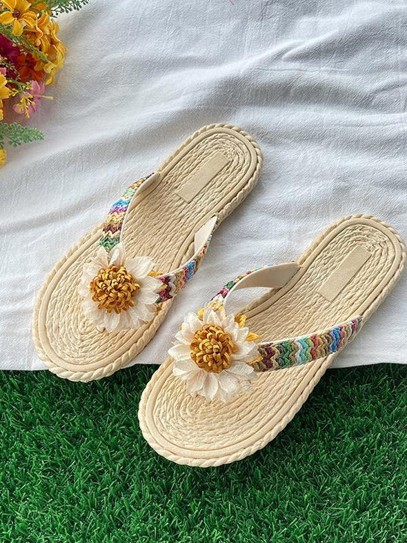 Braided floral resort style flip flops