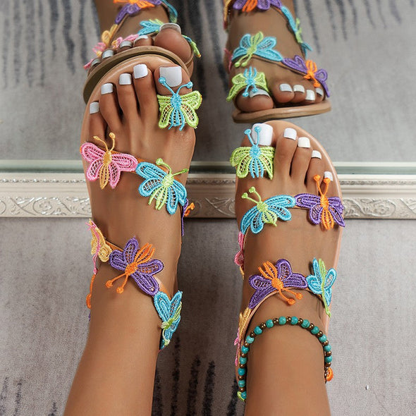 Flat floral slip-on sandals